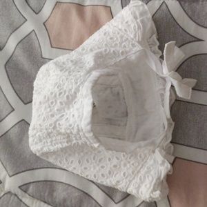 White hat with Velcro strap